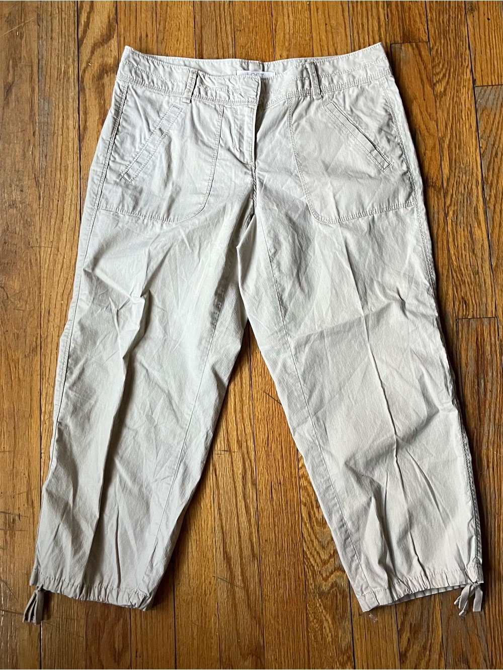 Tan 100% cotton mid rise capri pants with drawstring cuffs
